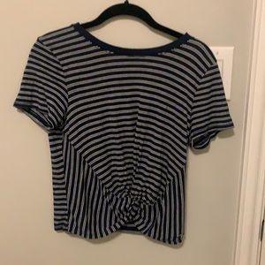 crossed blue and white striped shirt